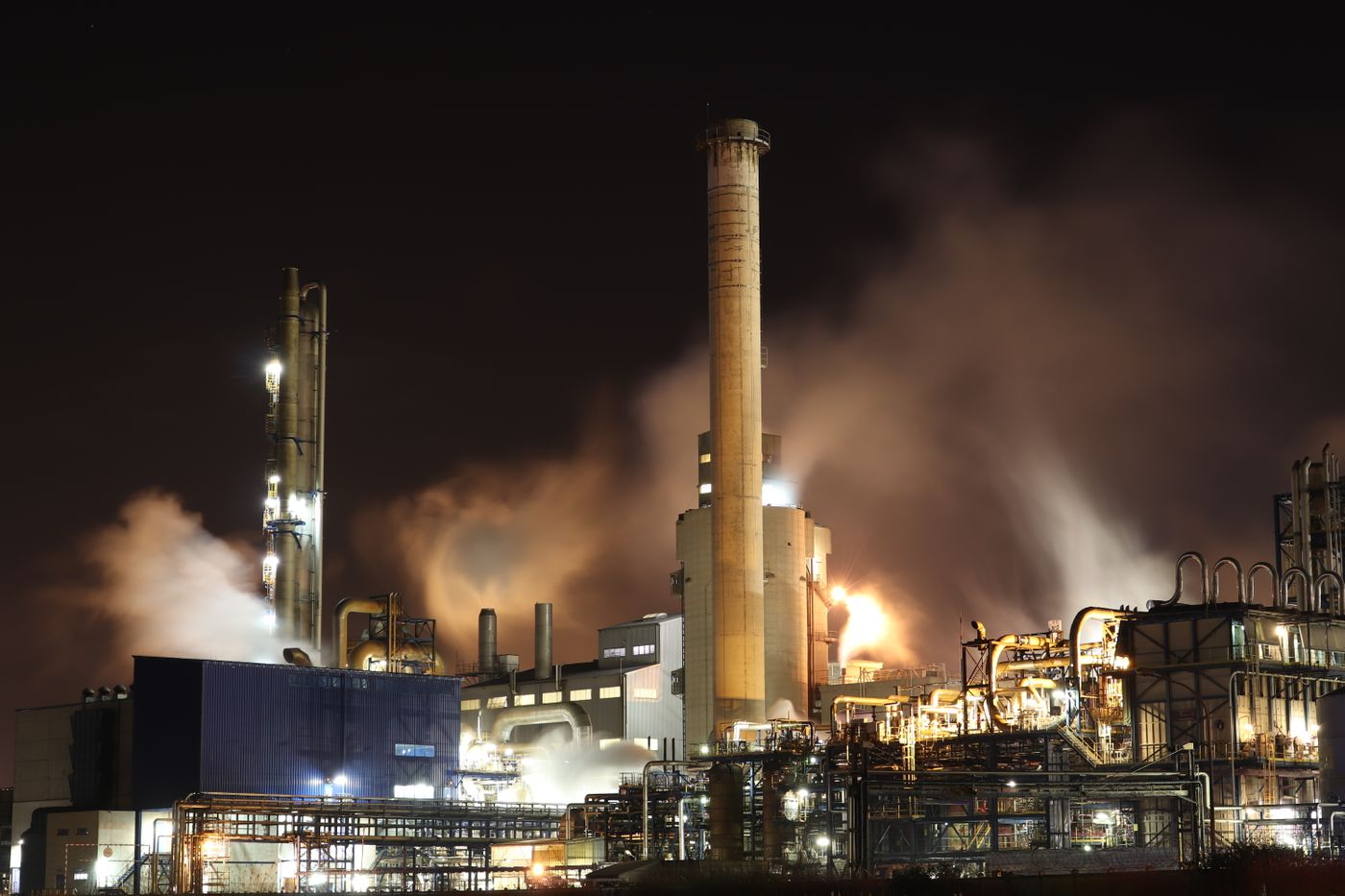 Oil and gas processing facility at night